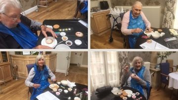 Biscuit champion decorating from Thamesfield care home
